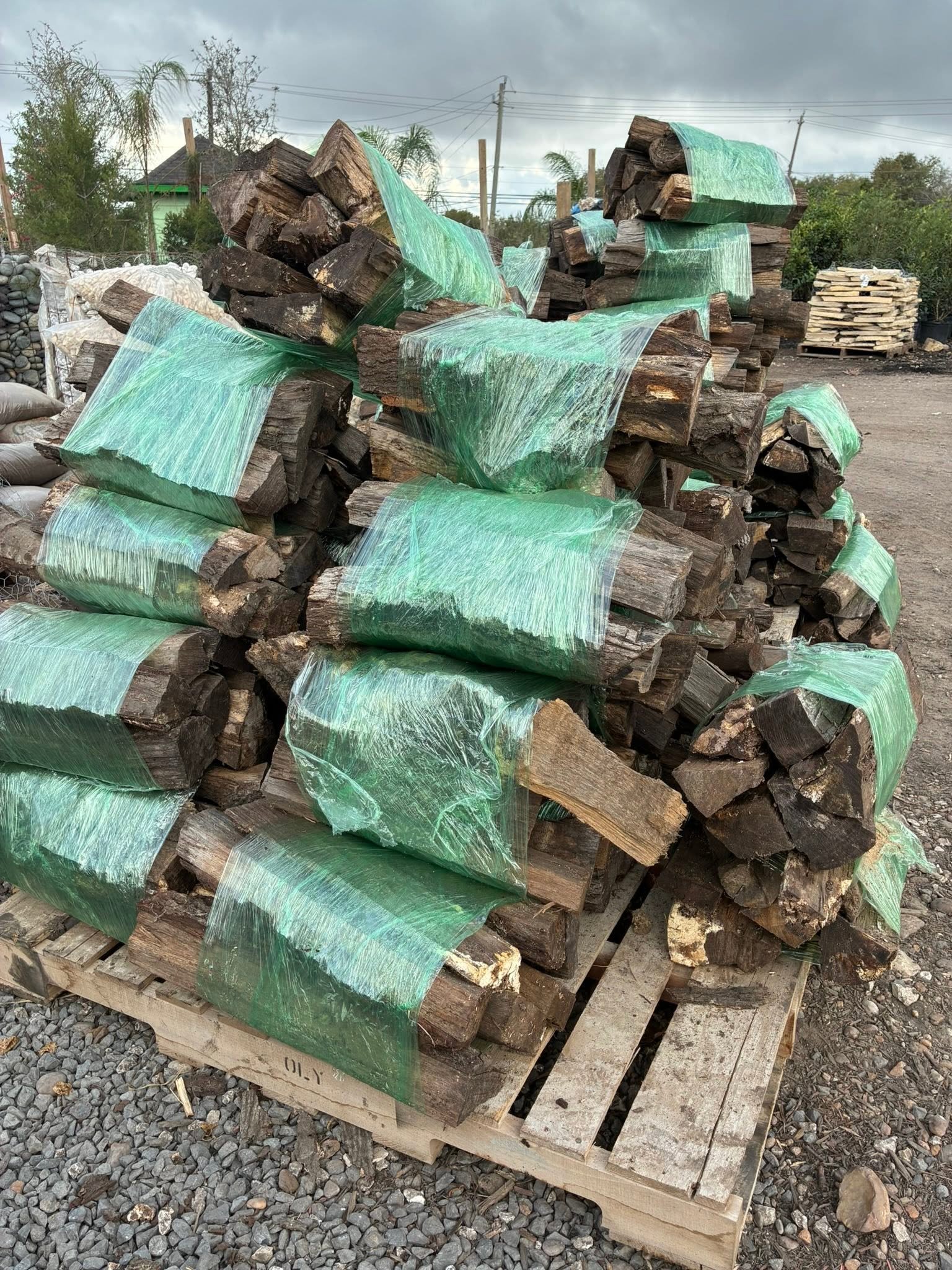 Bagged landscape material stacked on pallets